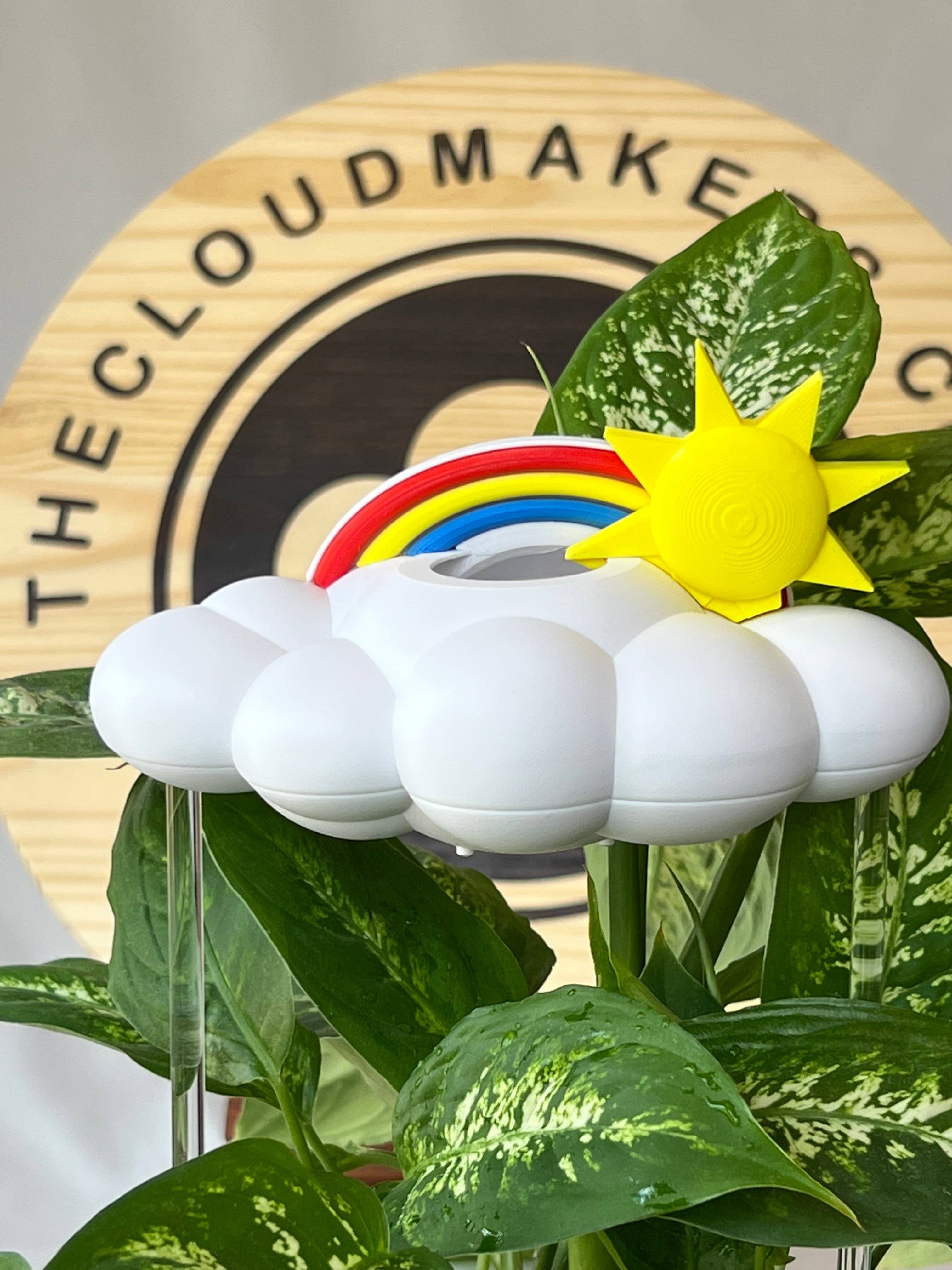 Dripping Rain Cloud with Sun and Rainbow Charms